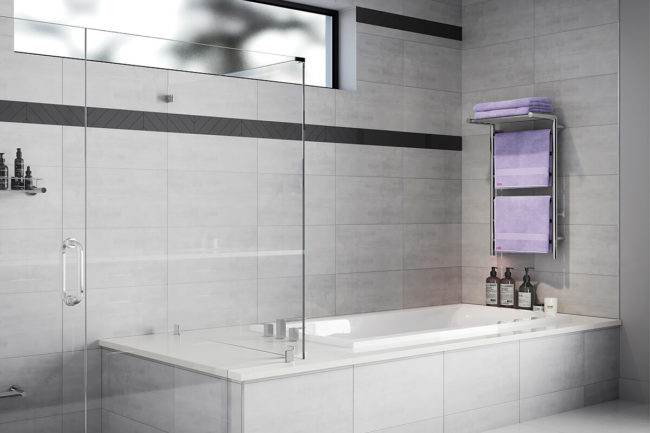 Setting of EDGE 10 Bar 20 inch heated towel rack in large bathroom at end of bath
