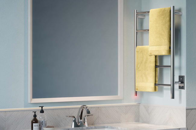 Setting of NATURAL 5 Bar heated towel rack 20in POLS next to sink small space