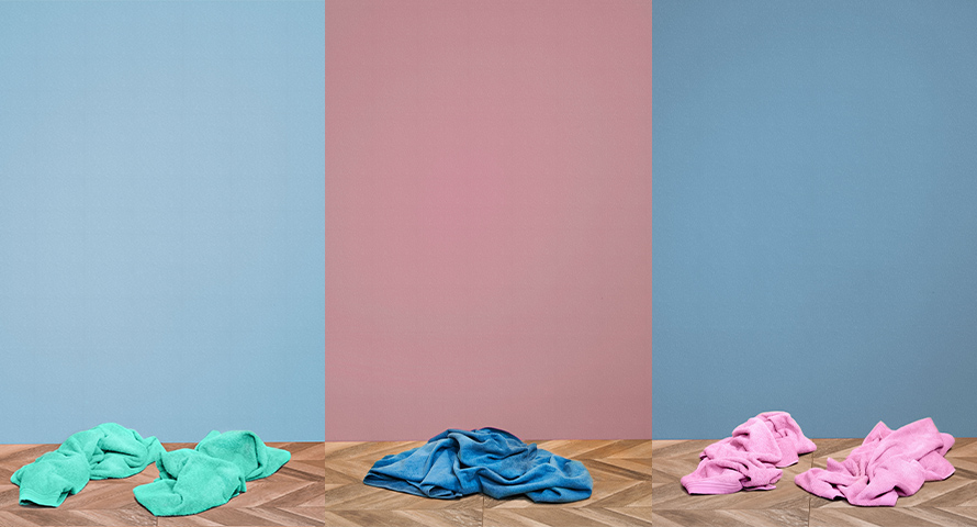 Towels on floor showing life without a heated towel rack