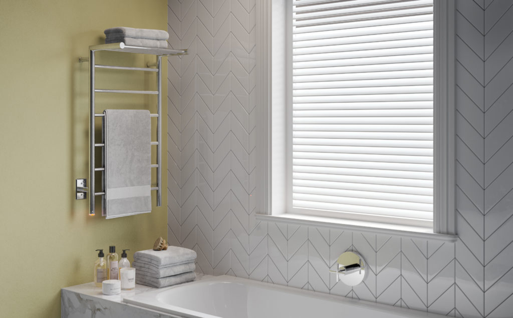 Edge 10-bar Heated Towel Rack on yellow wall with grey towels.